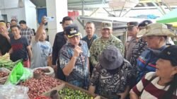 Jelang Idul Fitri 1447 H, Dandim 1310/Bitung Bersama Forkopimda Minut Sidak Pasar dan Bagikan Kupon Subsidi Sembako di Pasar Airmadidi