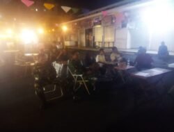 Ciptakan Suasana Akrab, Personel Kodim 1310/Bitung Nonton Bareng Piala Dunia 2026 Bersama Masyarakat